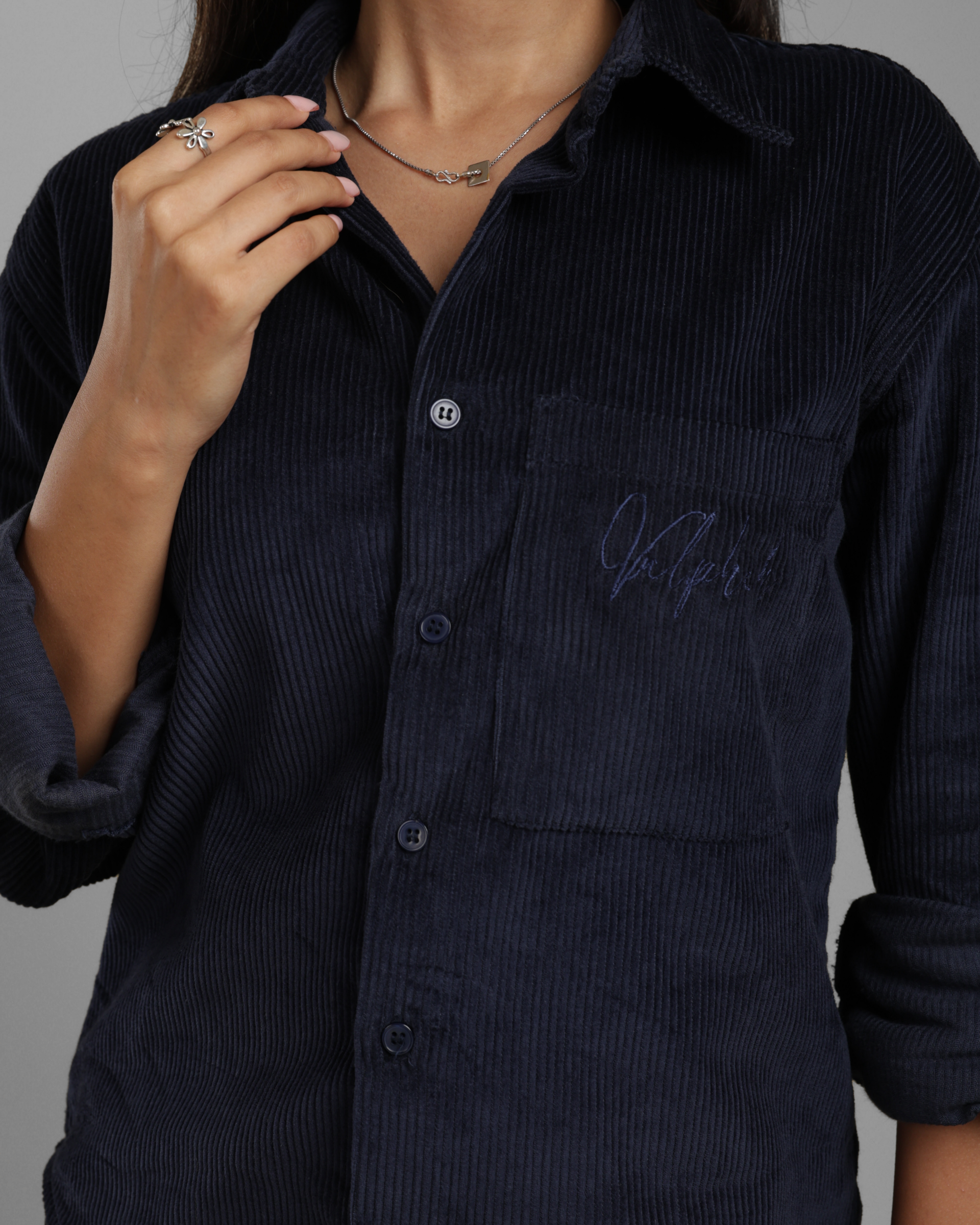 Navy blue corduroy shirt with 'Valphah' branding on a gray background